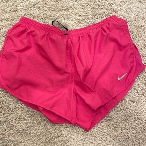 Pink NIKE dri fit running shorts